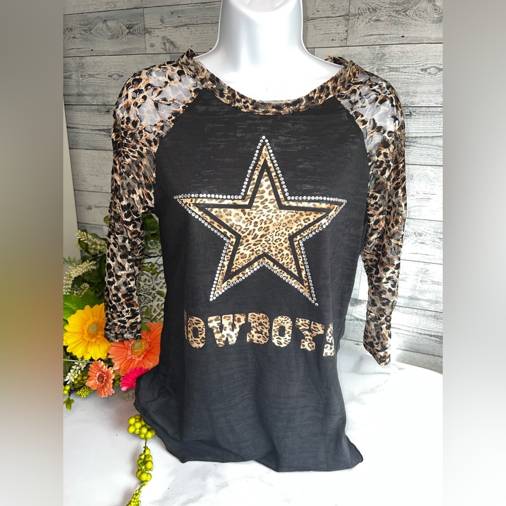 Dallas Cowboys black\leopard tee shirt size small.
